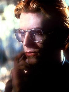 David Bowie wearing glasses